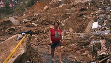 انهيار طيني ابتلع المنازل في البرازيل جرّاء الفيضانات (أ ف ب).