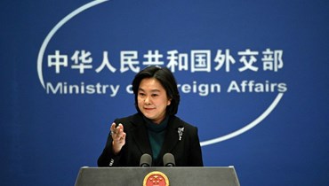 المتحدثة باسم وزارة الخارجية الصينية هوا تشونينغ خلال المؤتمر الصحافي اليومي في وزارة الخارجية في بيجينغ (24 شباط 2022، أ ف ب). 