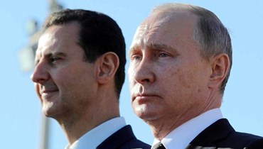 الرئيسان فلاديمير بوتين وبشار الأسد (أ ف ب).