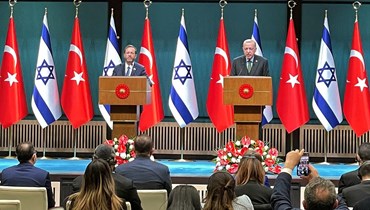 الرئيسان التركي والإسرائيلي (أ ف ب).