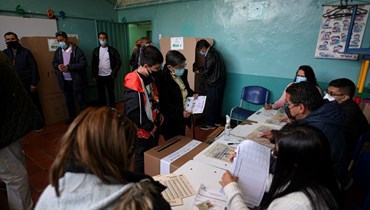 تصويت في مركز اقتراع في بوغوتا (13 آذار 2022، ا ف ب). 