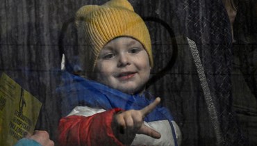 طفل أوكراني (أ ف ب).