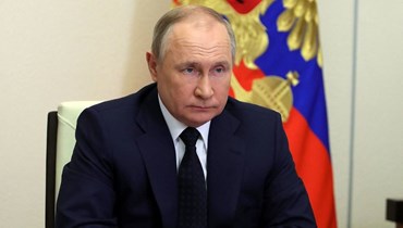 الرئيس الروسي فلاديمير بوتين يترأس اجتماعاً حكومياً عبر الفيديو في نوفو-أوغاريوفو (23 آذار 2022 - أ ف ب).