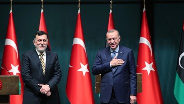 الرئيسان التركي والليبي.