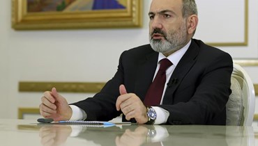 باشينيان متكلما خلال مؤتمر صحافي عبر الإنترنت في يريفان (23 ت2 2021، أ ب). 
