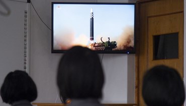 كوريا الشمالية خلال إطلاق الصاروخ الباليستي العابر للقارات (أ ف ب).