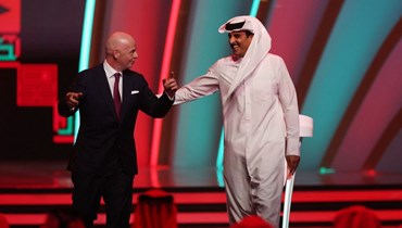 أمير دولة قطر الشيخ تميم بن حمد آل ثاني ورئيس الاتحاد الدولي لكرة القدم جياني انفانتينو.