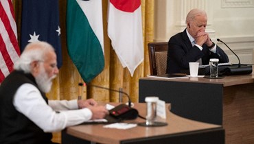 صورة أرشيفية- بايدن مجتمعا بمودي ورئيسي الوزراء الياباني سوغا يوشيهيدي والأوسترالي سكوت موريسون خلال قمة لقادة الرباعية في البيت الأبيض في واشنطن (24 ايلول 2021- أ ف ب). 