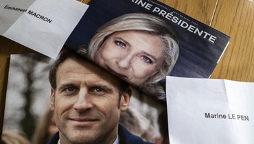 المرشحان للرئاسة الفرنسية ماكرون ولوبن (أ ف ب).
