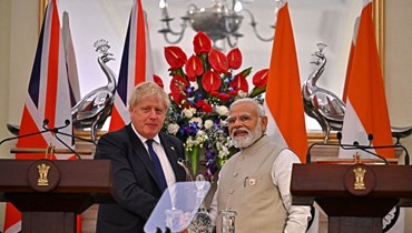 رئيسا وزراء الهند وبريطانيا (أ ف ب).