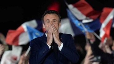 الرئيس الفرنسي إيمانويل ماكرون يحتفل أمام مناصريه بفوزه بولاية ثانية - "أ ب"
