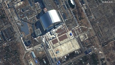 صورة من الاقمار الاصطناعي مكسار تم التقاطها ونشرها في 10 آذار 2022، وتظهر محطة تشيرنوبيل للطاقة النووية في بريبيات بأوكرانيا (أ ف ب). 