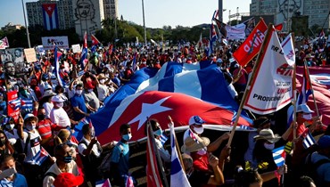 متظاهرون تجمعوا في ساحة الثورة في هافانا في مناسبة عيد العمال (1 ايار 2022، أ ف ب). 