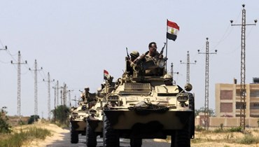 آليات عسكرية مصرية (أ ف ب).