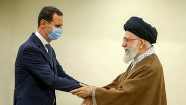 خامنئي مستقبلا الأسد في طهران (8 ايار 2022، أ ف ب).