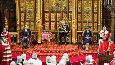 الأمير تشارلز يقرأ خطاب الملكة خلال جلسة افتتاح البرلمان البريطاني في لندن (10 ايار 2022، أ ف ب). 