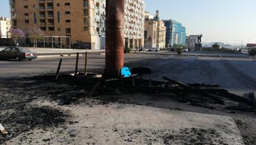 إحراق قبضة الثورة وسط بيروت (حسن عسل).