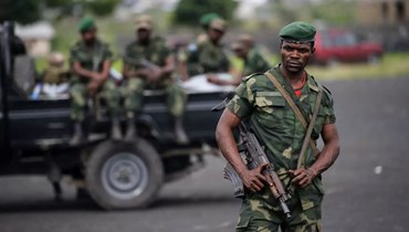 جنود في جيش كونغو الديموقراطية خلال دورية في احدى المناطق (أ ف ب).