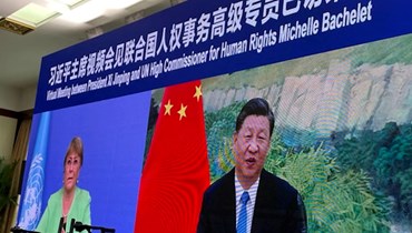 باشليه (إلى اليسار) تحضر اجتماعًا افتراضيًا مع الرئيس الصيني شي جينبينغ في قوانغتشو (25 ايار 2022، أ ف ب).