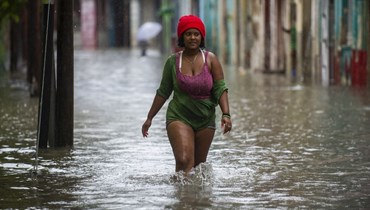  أمطار غزيرة مرتبطة بمرور الإعصار آغاثا في كوبا (أ ف ب). 