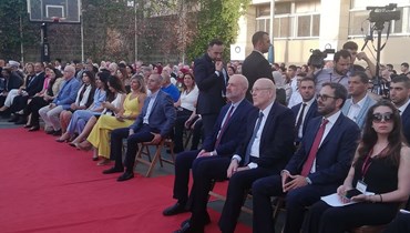 رئيس حكومة تصريف الأعمال ووزير الداخلية بسام مولوي في حضورهما لحفل تخريج جامعة العزم.