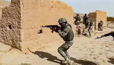 صورة ارشيفية- جنود خلال مناورات حربية مشتركة للقوات الروسية والطاجيكية في ميدان رماية مومراك شمال الحدود الأفغانية بطاجيكستان (22 ت1 2021، أ ب). 