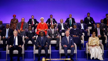 (من اليسار) جونسون، كاغامي، الأمير تشارلز، وسكوتلاند خلال افتتاح قمة الكومنولث في كيغالي (24 حزيران 2022، أ ف ب). 