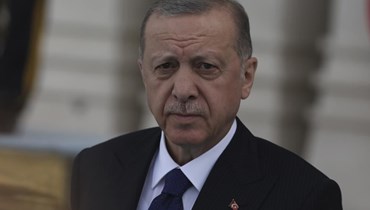 إردوغان لدى وصوله الى استقبال رسمي في أنقرة (8 حزيران 2022، أ ب). 