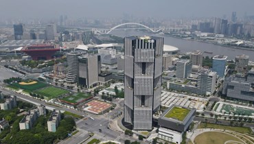 تظهر الصورة الملتقطة جواً في 17 يونيو 2022 مبنى المقر الرئيسي لبنك التنمية الجديد، المعروف أيضا باسم بنك بريكس، في شانغهاي بشرق الصين (شينخوا)