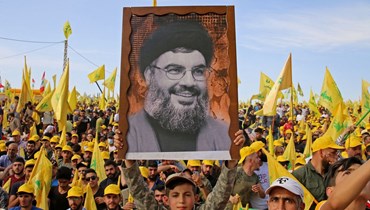 مشهد من احتفال حزبيّ لمناصري "حزب الله" (أ ف ب).