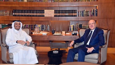 الرئيس نجيب ميقاتي ووزير الخارجية القطرية الشيخ محمد بن عبد الرحمن آل ثاني.