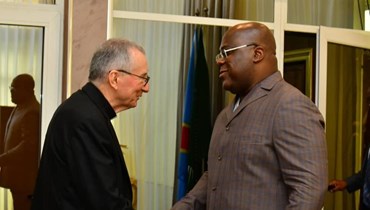 الكاردينال بارولين (الى اليسار) ملتقيا الرئيس فيليكس تشيسكيدي خلال زيارته للكونغو الديموقراطية (2 تموز 2022، امانة سر دولة الفاتيكان). 