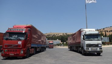  إيصال المساعدات عبر الحدود إلى سوريا (أ ف ب). 