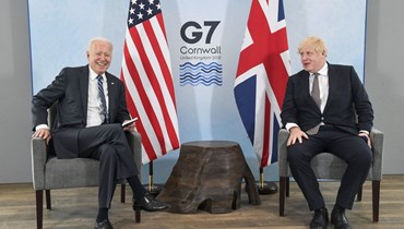 الرئيس الأميركي جو بايدن ورئيس الوزراء البريطاني المستقيل بوريس جونسون في قمة مجموعة السبع، 2021 - "أ ب"