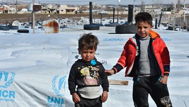 طفلان سوريّان في مخيمات النزوح في المرج البقاعية (أرشيفية، مارك فياض).