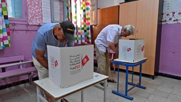 من الانتخابات في تونس (أ ف ب).