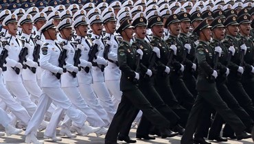الجيش الصيني خلال عرض عسكري سنة 2019 - "أ ف ب"
