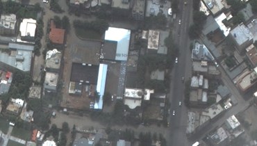 صورة من شركة Maxar Technologies التُقطت في 12 تموز 2022، وتظهر المبنى (في الوسط) الذي من المحتمل أن كان فيه الظواهري وقت الضربة التي قتلته (2 آب 2022، أ ف ب).