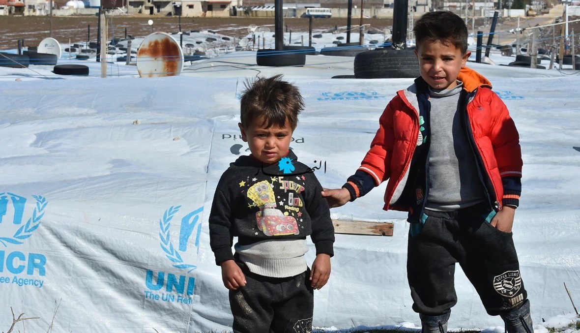 طفلان سوريّان في مخيمات النزوح في المرج البقاعية (أرشيفية، مارك فياض).