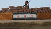 مقاتل سوري مدعوم من تركيا تمركز في موقع على أطراف بلدة كلجبرين بمحافظة حلب شمال سوريا (8 آب 2022، أ ف ب). 