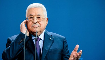 عباس خلال مؤتمر صحافي مشترك مع المستشار الألماني (ليس في الصورة) في مقر المستشارية في برلين (16 آب 2022، أ ف ب). 