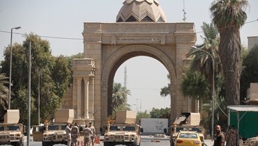 عناصر من القوات العراقية انتشروا خلال انسحاب أنصار الصدر من المنطقة الخضراء في بغداد (30 آب 2022، أ ف ب). 