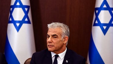 لبيد يحضر الاجتماع الأسبوعي لمجلس الوزراء في القدس (11 أيلول 2022، ا ف ب). 