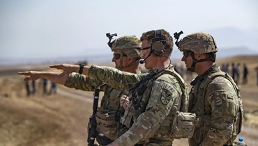جنود أمريكيون يشاركون في تمرين عسكري في ريف بلدة المالكيّة في محافظة الحسكة شمال شرق سوريا (أ ف ب).
