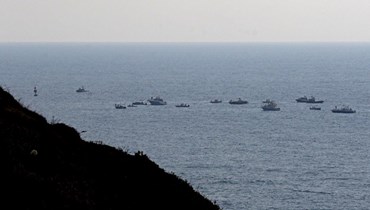 سفن لبنانية في المياه الإقليمية اللبنانية قبالة رأس الناقورة ضمن حملة "نفط لبنان للبنان" (أ ف ب).
