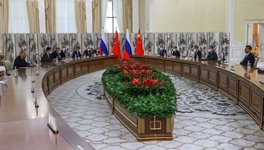 قمة بين الرئيسين الصيني شي جينبينغ والروسي فلاديمير بوتين على هامش أعمال قمة "منظمة شنغهاي للتعاون" - (أ ف ب)