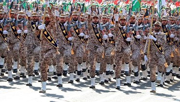 جنود إيرانيون خلال العرض العسكري السنوي في طهران في ذكرى الحرب مع العراق (22 أيلول 2022، ا ف ب). 