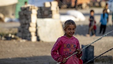 طفلة في مخيمات النزوح السوري (أ ف ب).