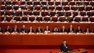 شي متكلما خلال الجلسة الافتتاحية للمؤتمر الـ20 للحزب الشيوعي الصيني في قاعة الشعب الكبرى في بيجينغ (20 ت1 2022، أ ف ب).