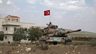 قوات تركية في منطقة كفر جنة عند أطراف بلدة عفرين السورية (18 ت1 2022، أ ف ب). 
